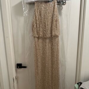 Brand new gold sequin gown,